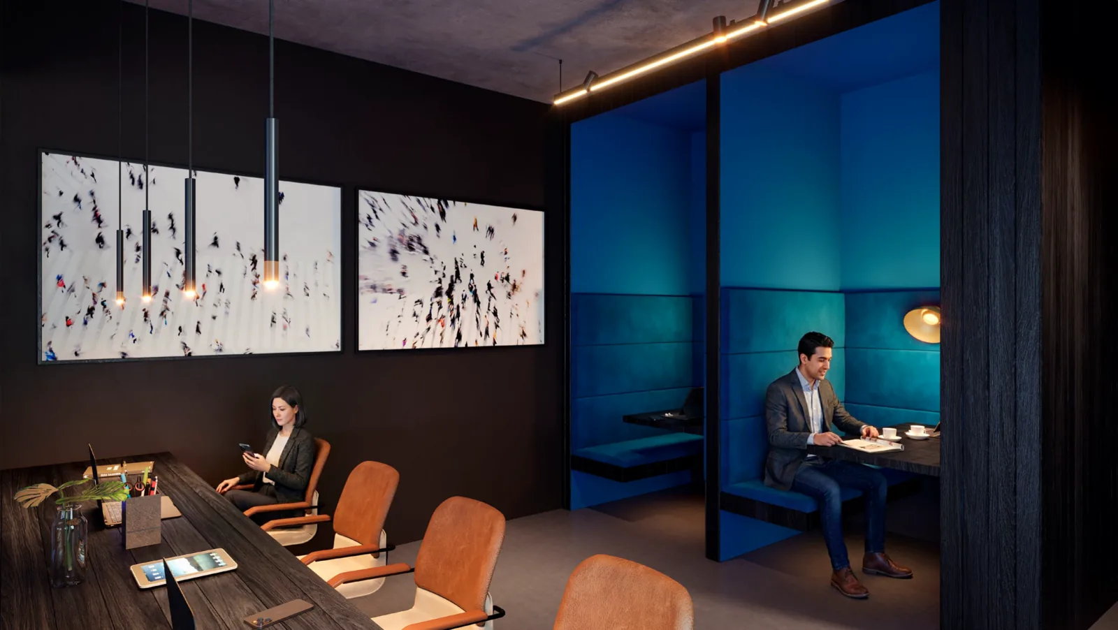 Coworking of the Single sub-condominium, with a collective table, phone booths and task lighting