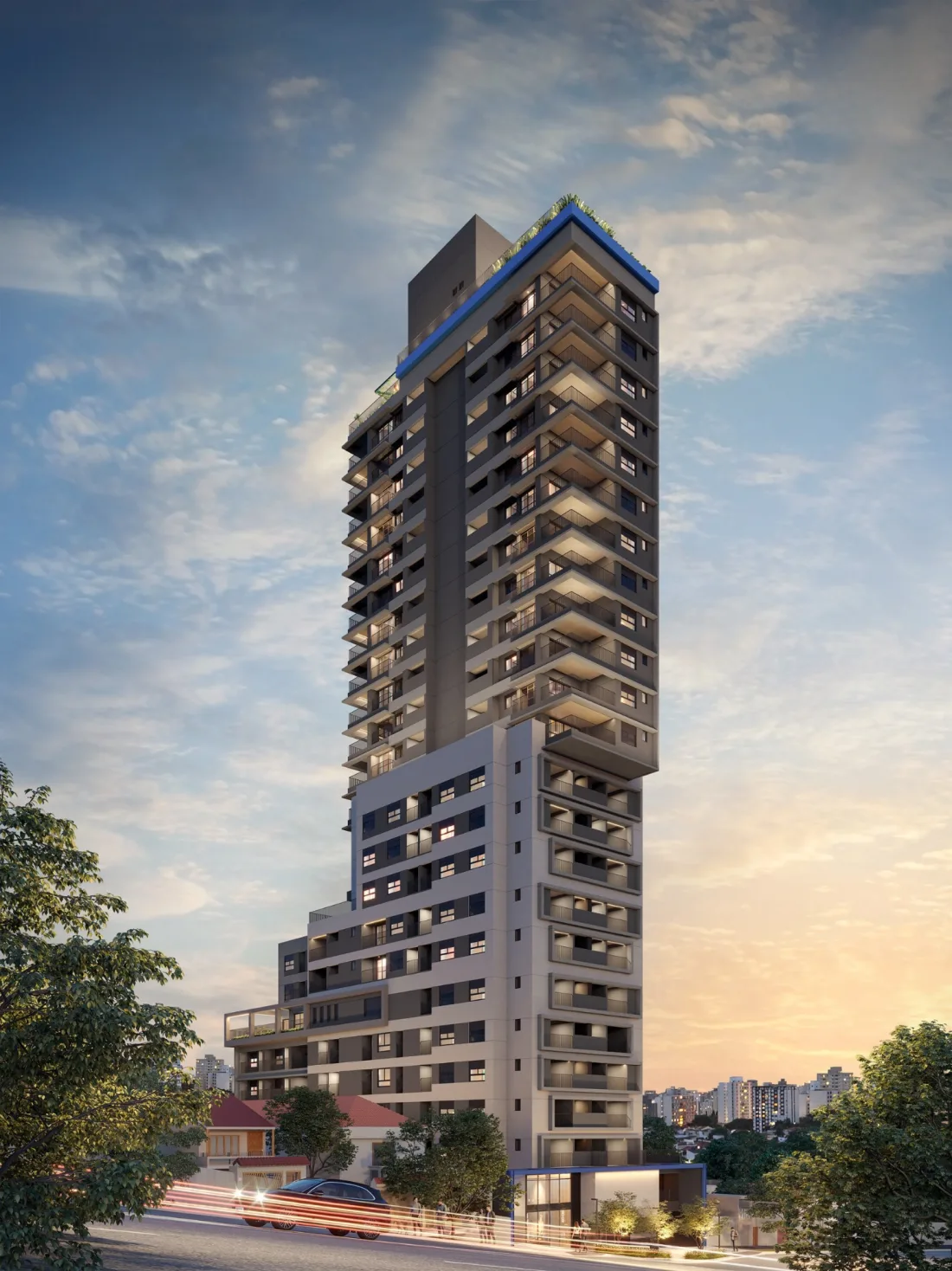 Street view of the Vitacon João Ramalho facade, the tower cut out against the evening sky