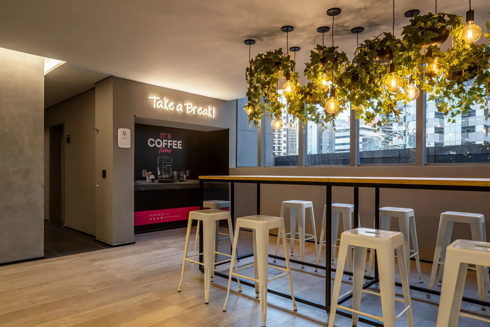 Cokitchen gourmet space with high counter and stools