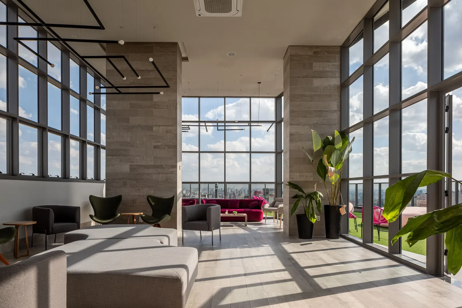 Double-height skybar with floor-to-ceiling city view